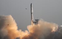 SpaceX rocket explosion over Florida sky, causing flight delays and air traffic disruptions due to falling debris.